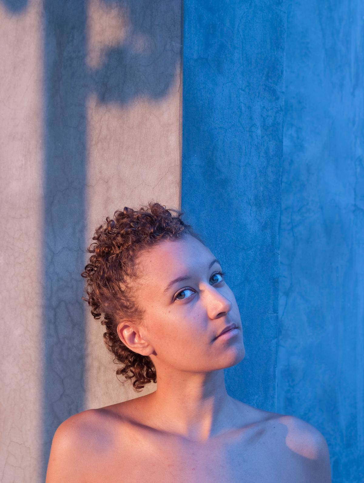 portrait shot of woman's head and shoulders