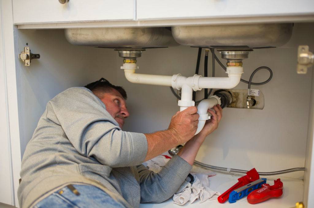 Plumber working