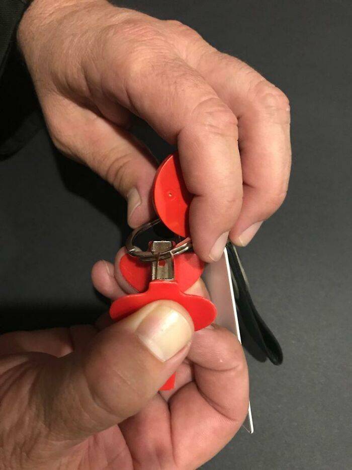 using staple remover to open key ring
