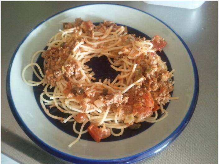 hole in middle of spaghetti on plate