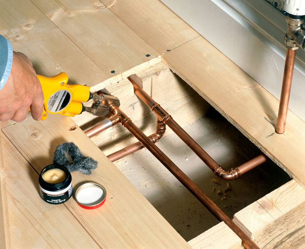 Man tightening valve