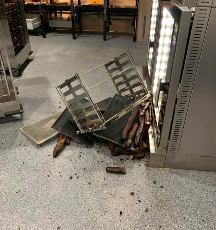 trays of burnt baguettes spilled on the floor