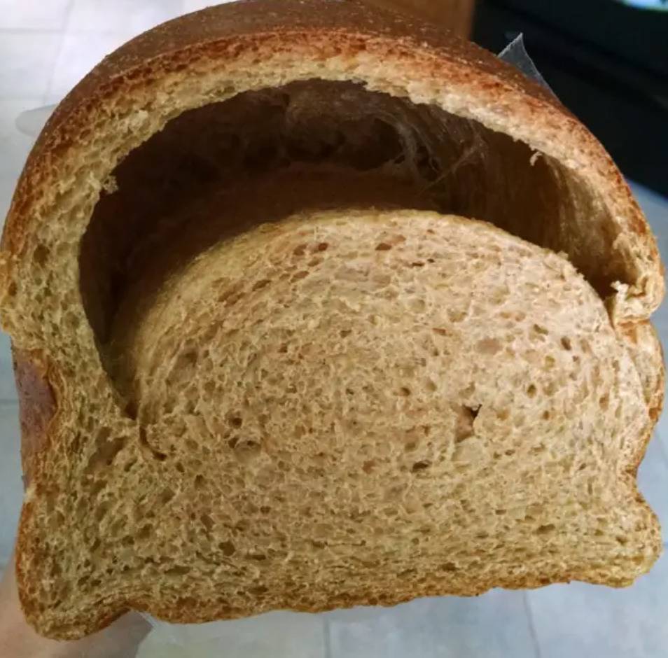 bread loaf is half-empty near top crust