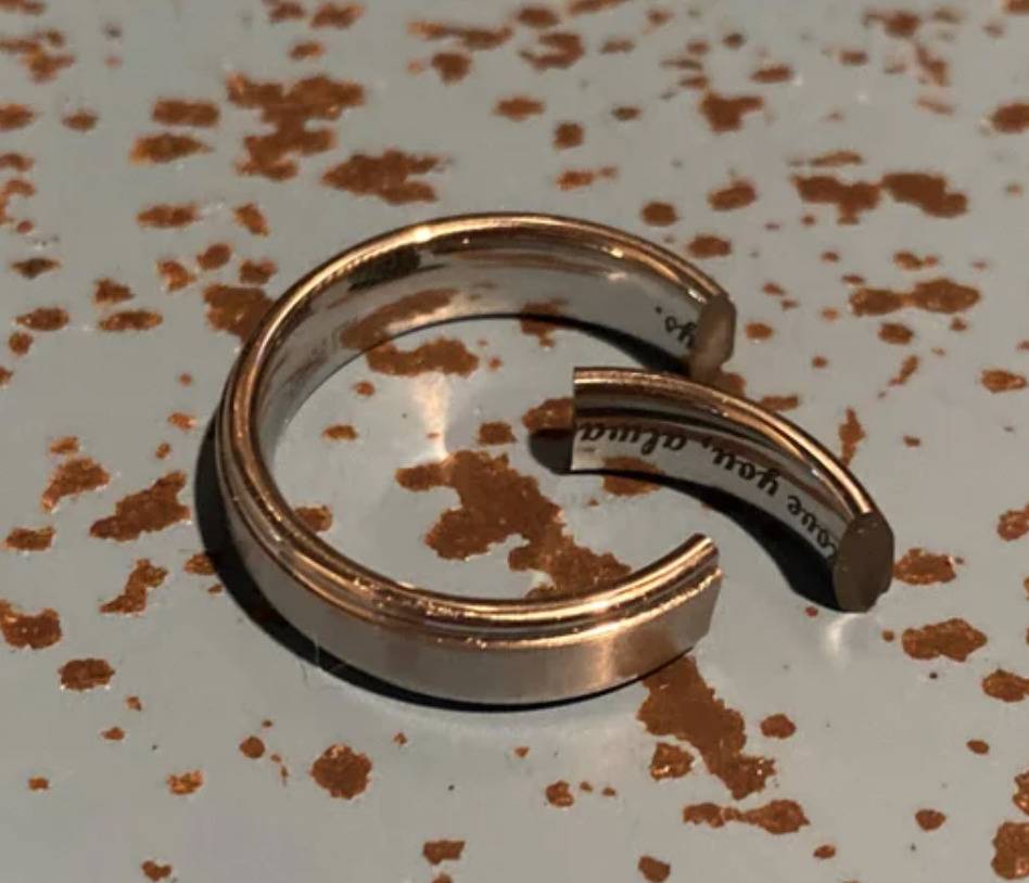 wedding band is broken with segment entirely detached