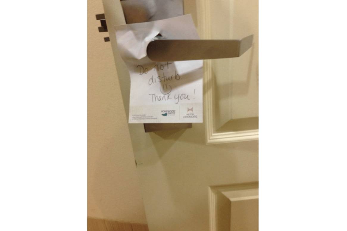 make shift do not disturb sign at Hilton hotel