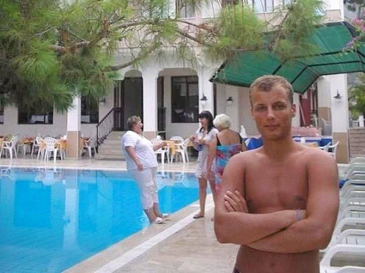 woman about to fall over into pool