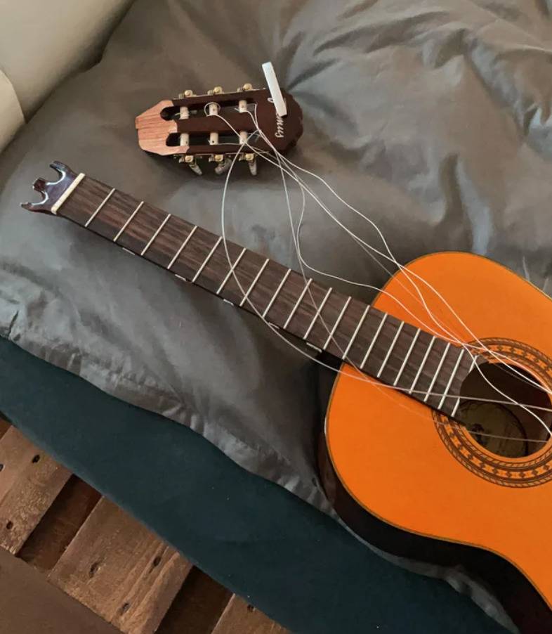 guitar with neck snapped