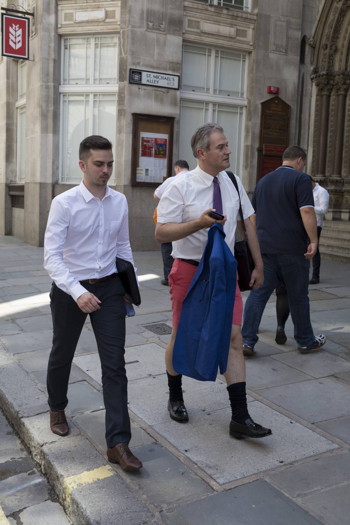As heatwave temperatures climb to record levels - the hottest day of the year so far - Londoners in the City of London (the capital's financial district aka the Square Mile) took to wear informal dress codes including shorts and sports shirts, on 25th July 2019, in London, England.
