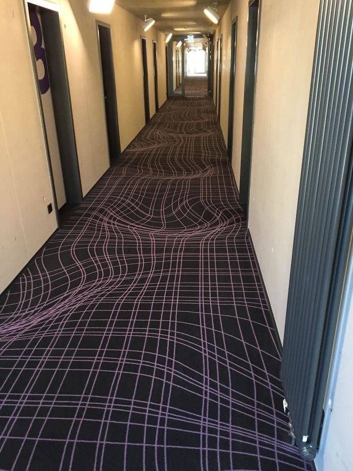 hotel hallway rug with distorting pattern