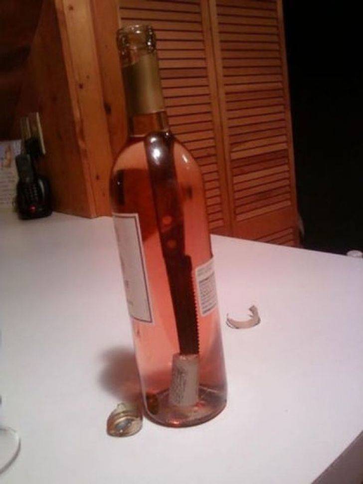 Knife inside wine bottle