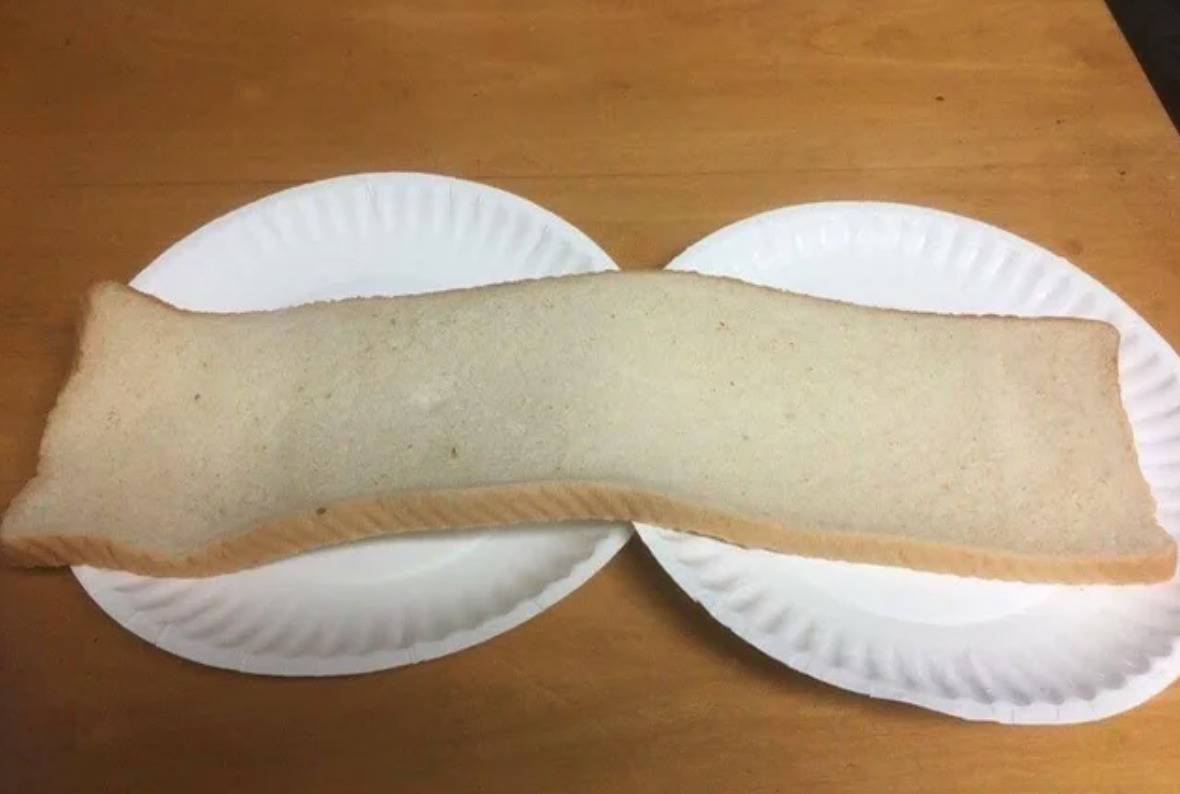long slice of bread because loaf was sliced horizontally