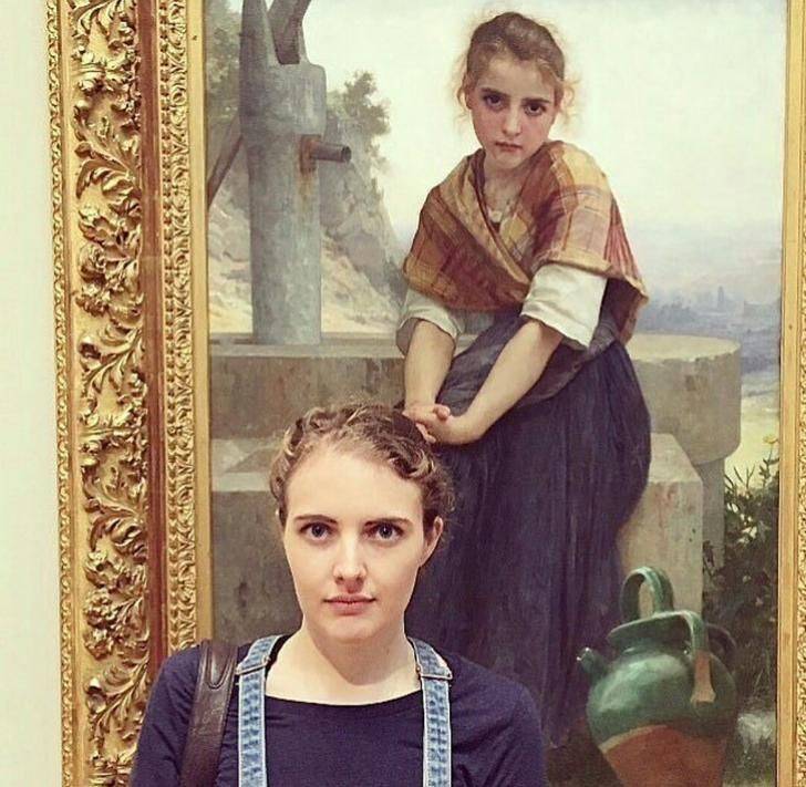 woman looks like woman in painting