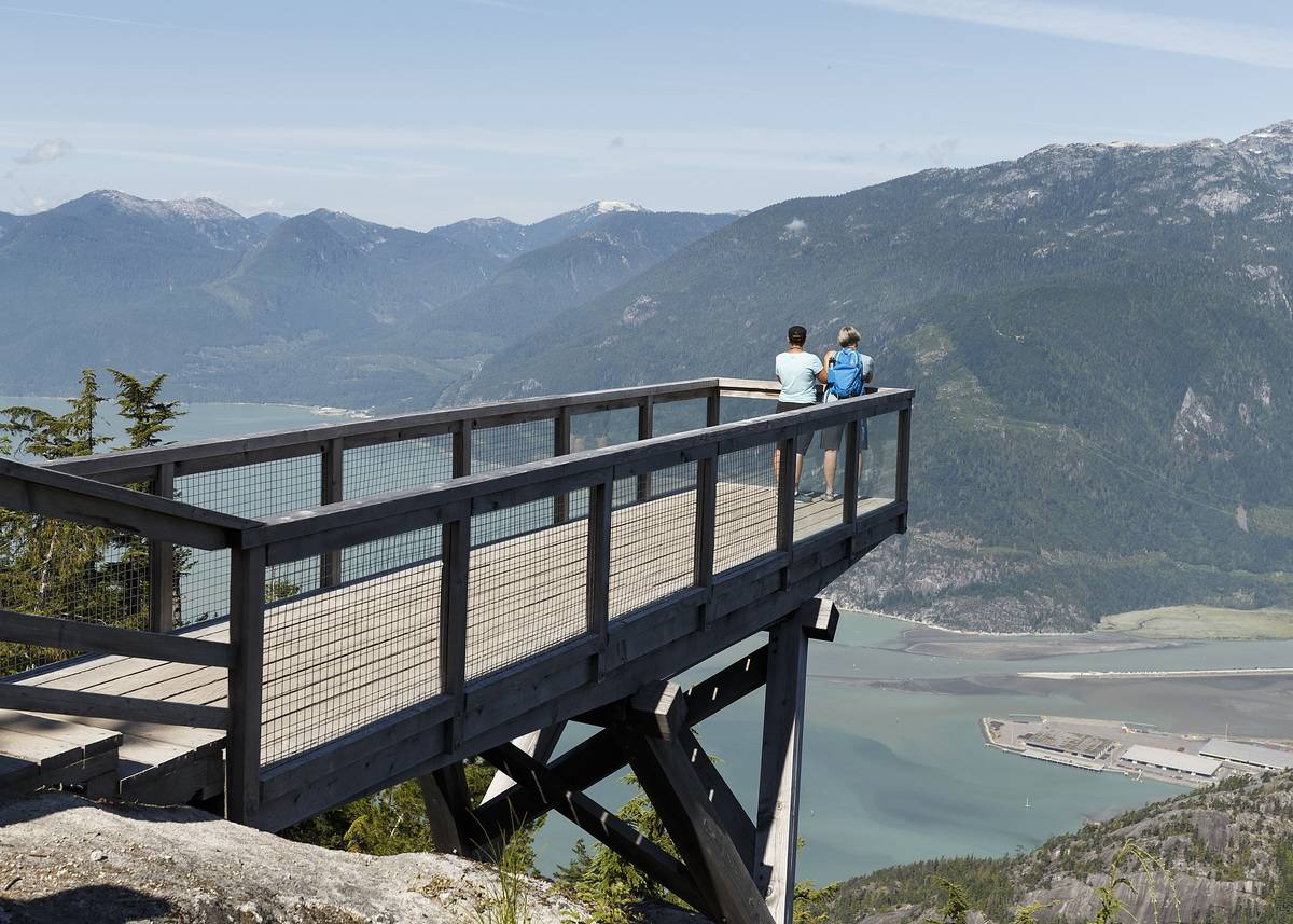 Two women look over The Chief Overlook Viewing Platform on Panorama Trail at Sea to Sky Gondola on August 01, 2020 in Squamish, British Columbia