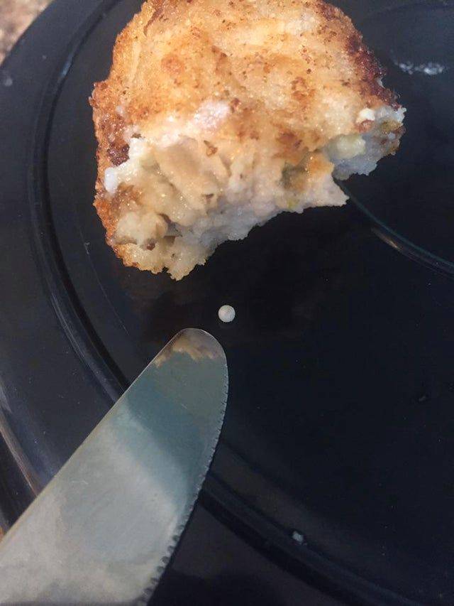 dinner plate with a pearl on it