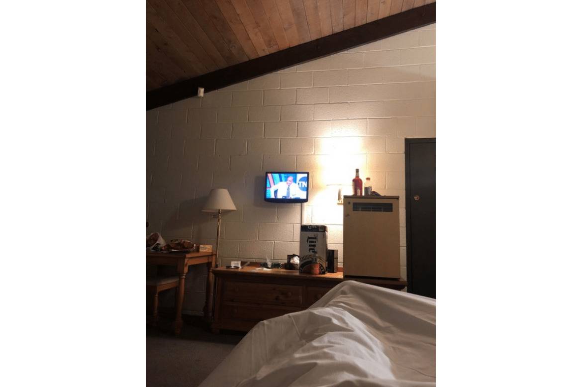 Small television screen in hotel room