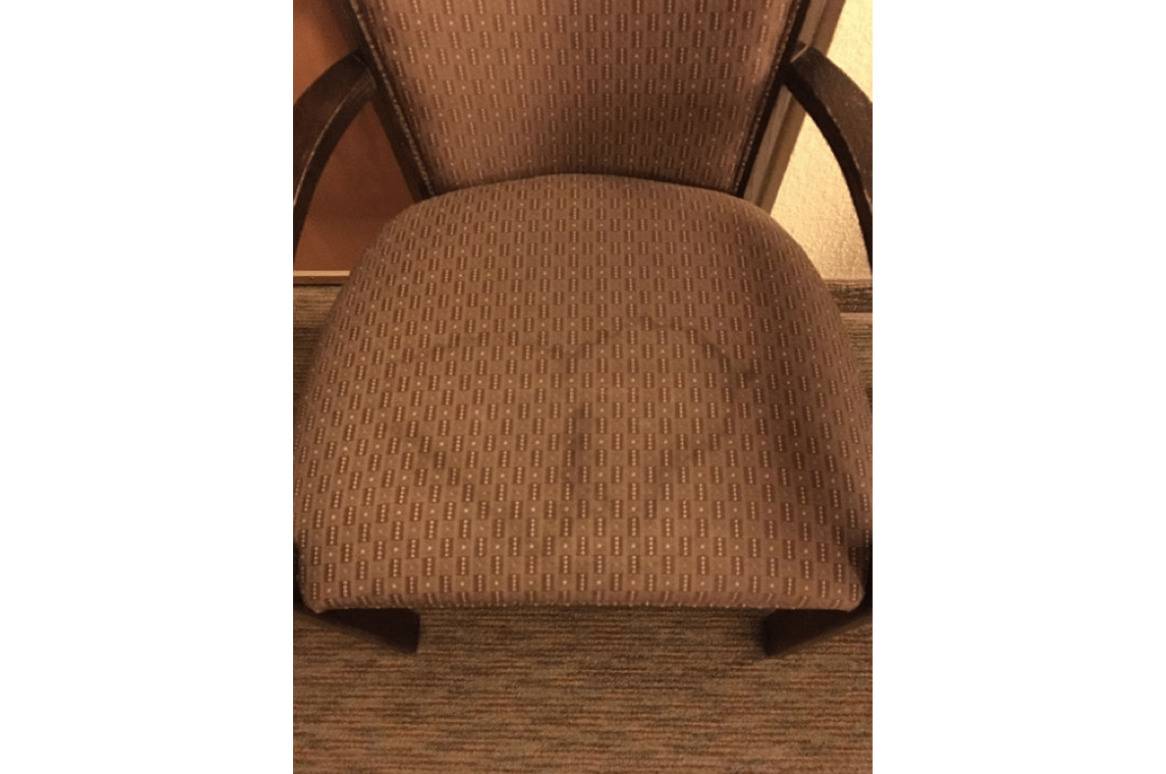 hotel chair has butt sweat stain
