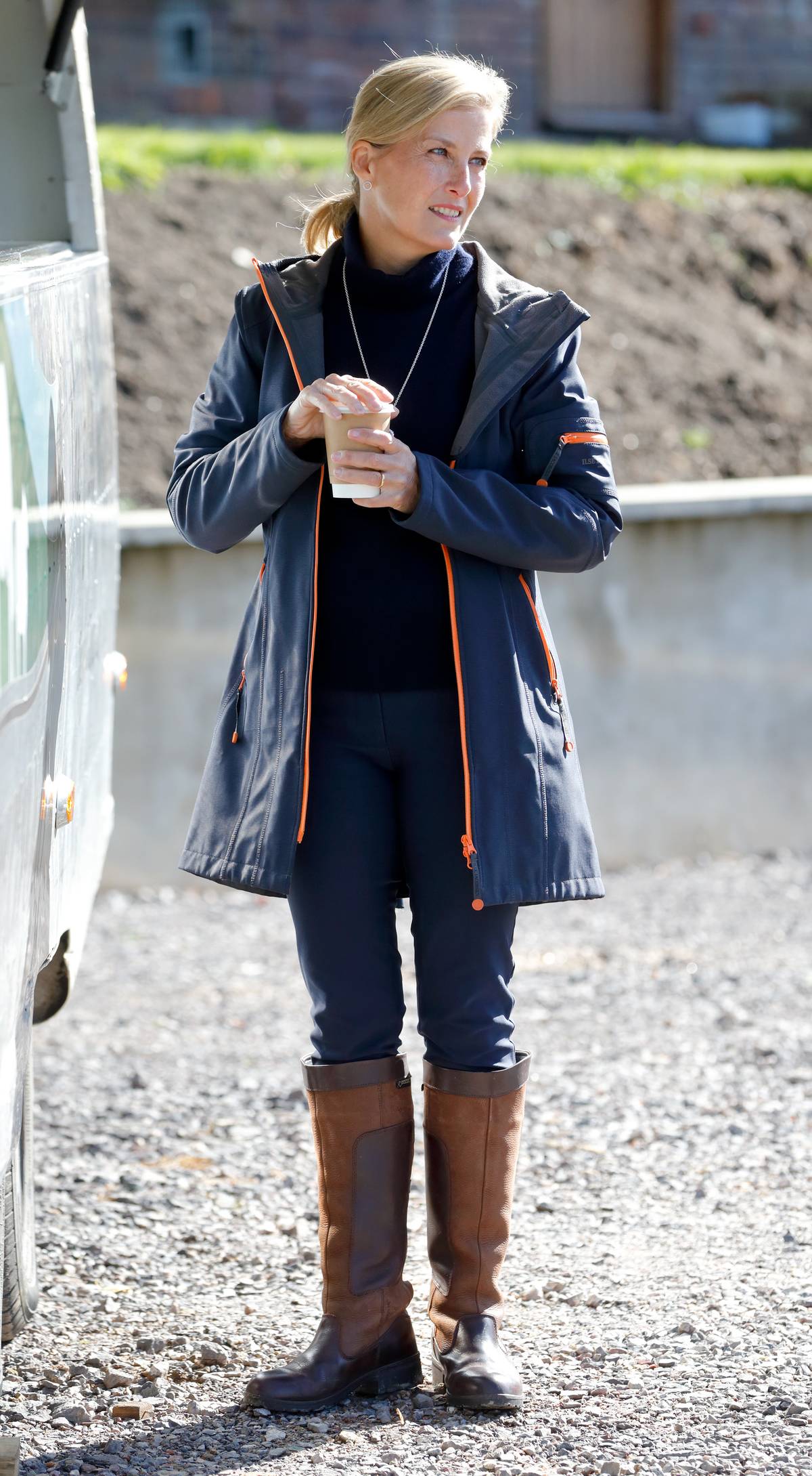 The Countess Of Wessex Undertakes Engagements In Surrey wearing riding boots