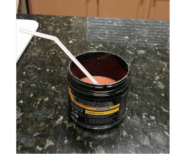 protein shake in protein powder container 