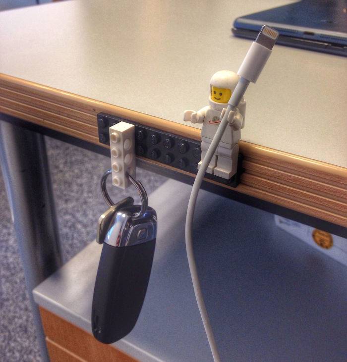 Lego minifig holding charging cord