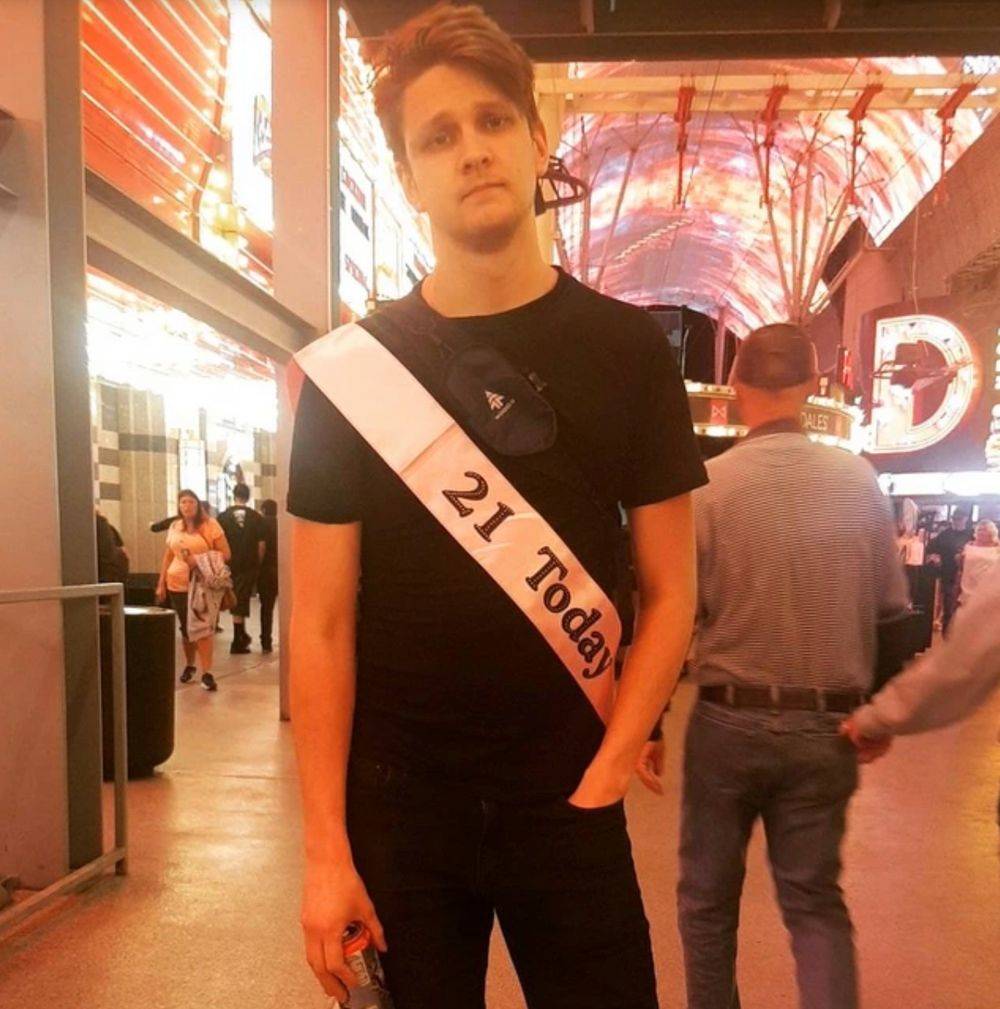 guy wearing 21 today sash 