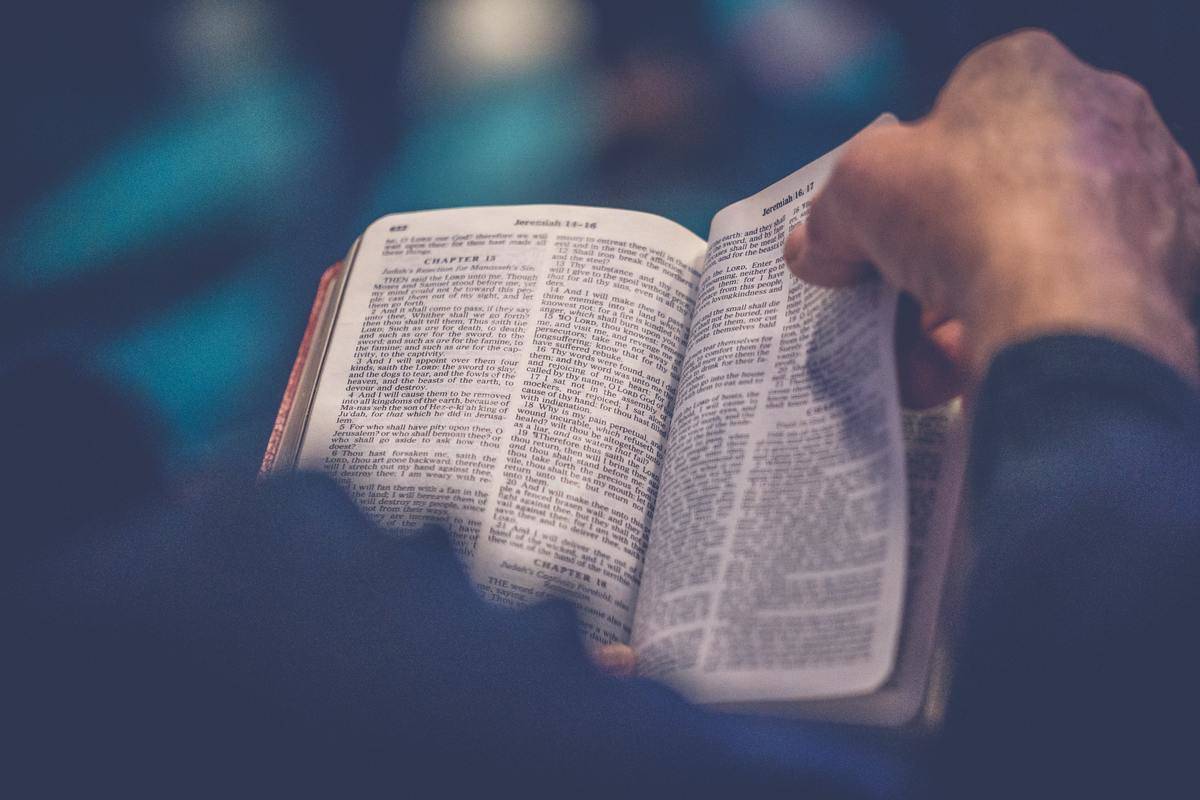 man reading the bible