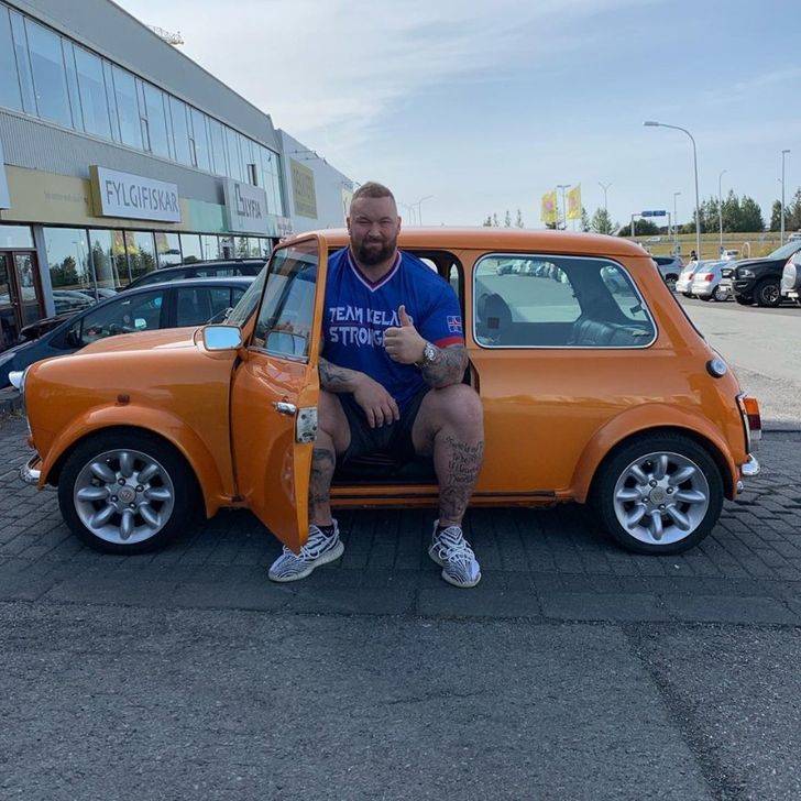 big man on campus in car