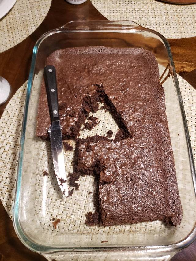sister cut brownie from the center of the pan