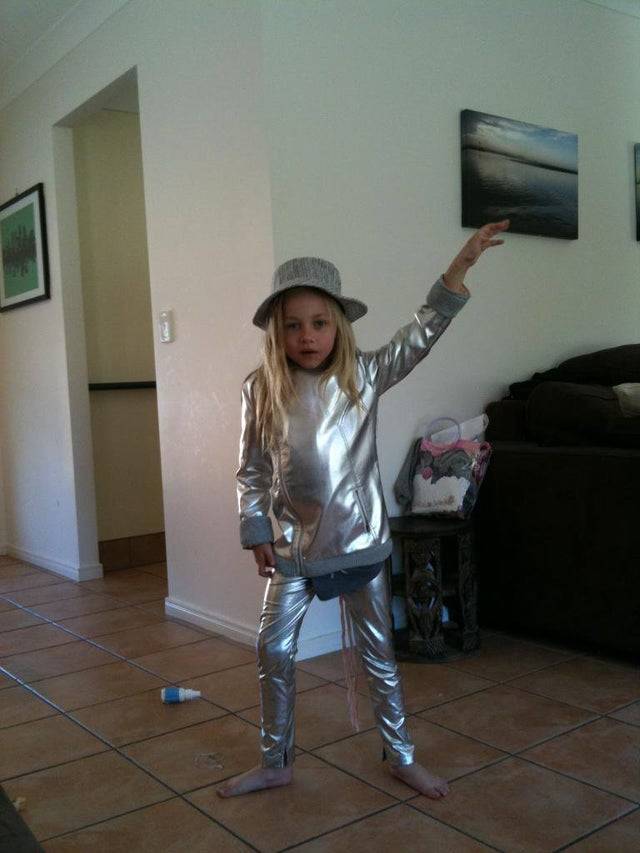 daughter in disco clothes posing