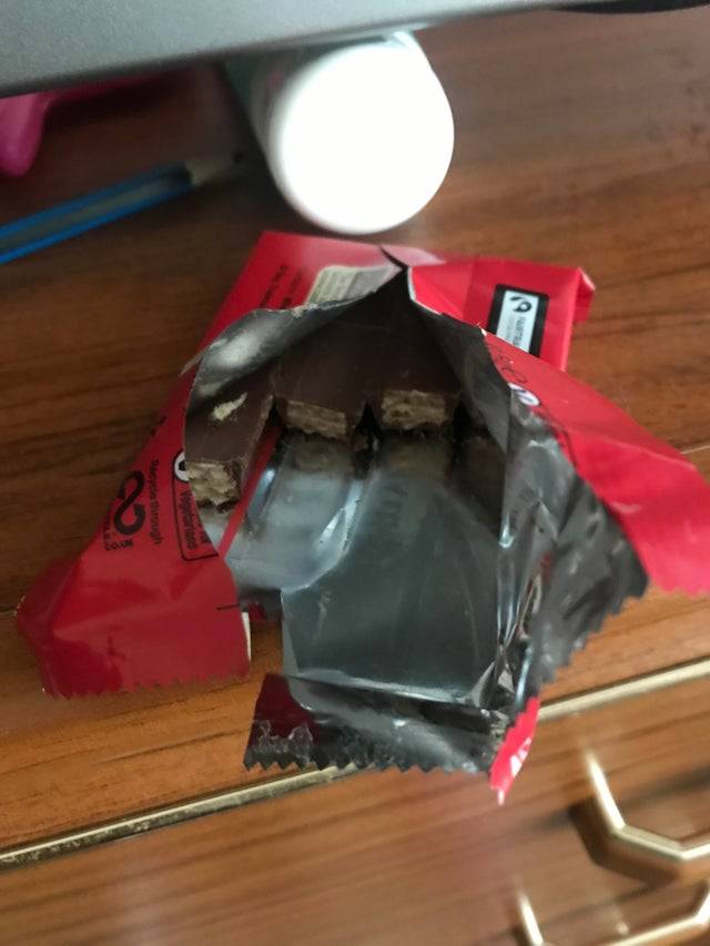 wife left husband half a kitkat but she bit into it without breaking the pieces apart properly
