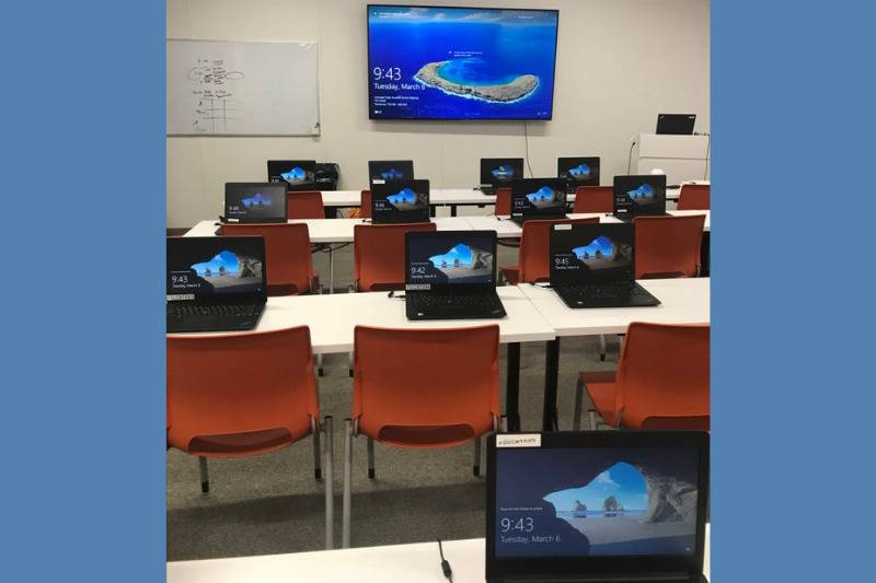 laptop with various clocks in the same classroom