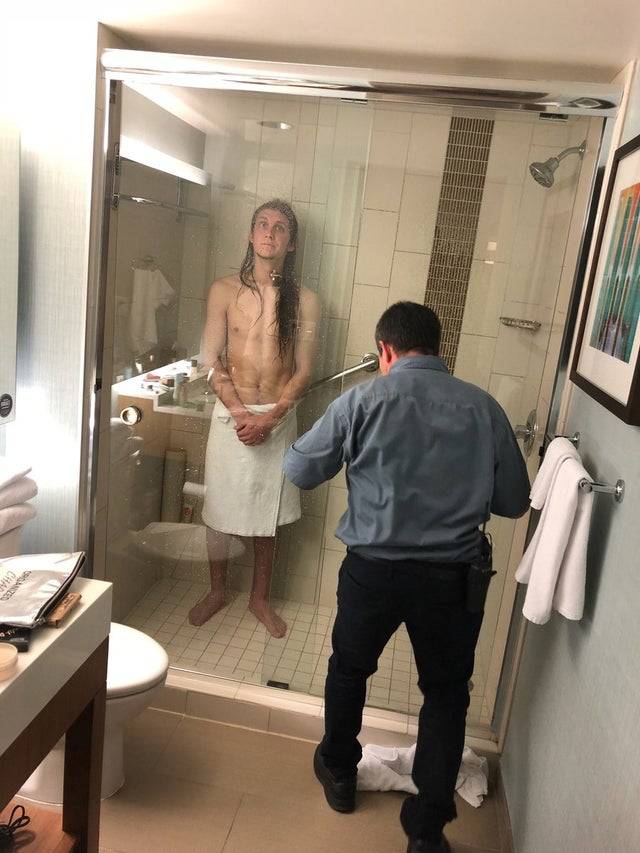 hotel staff member trying to break out man stuck in shower for three hours