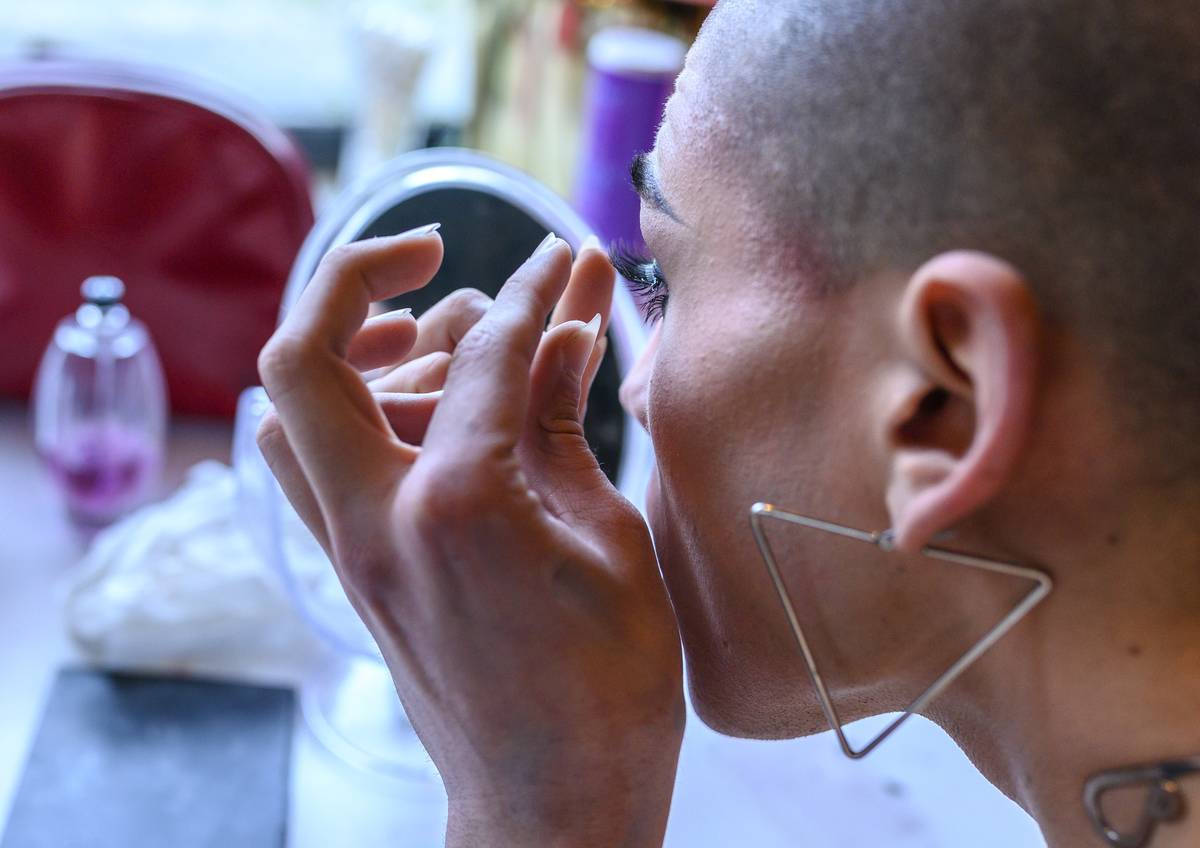 Portuguese Drag Queen performer Diogo Conde (stage name Khaos) applies false eyelashes
