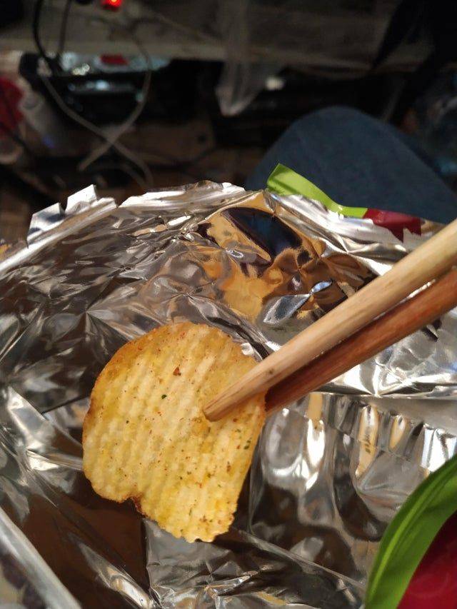 picking up chip with chopsticks