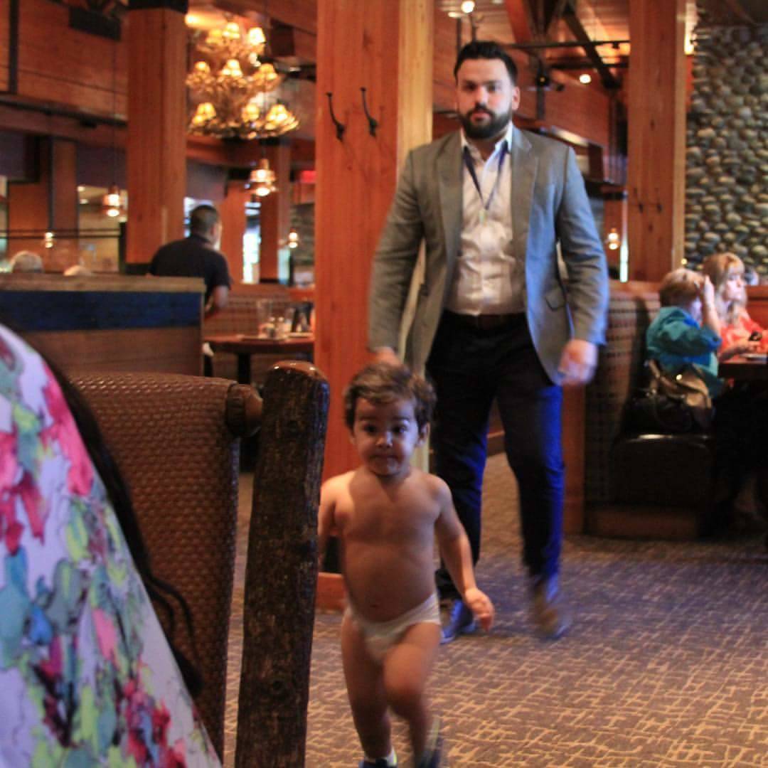 naked baby running around the restaurant