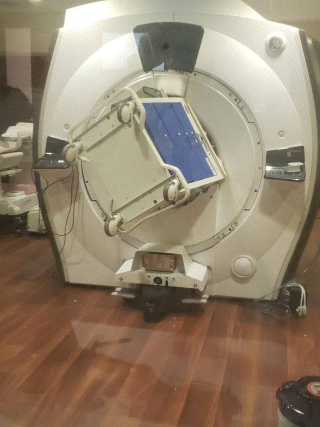 MRI machine with large metal object stuck to it