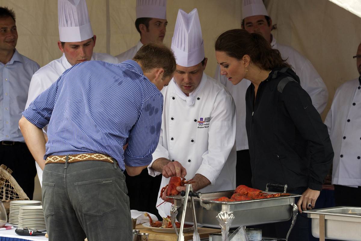 The Duke And Duchess Of Cambridge meet with local chefs who are cooking oysters.