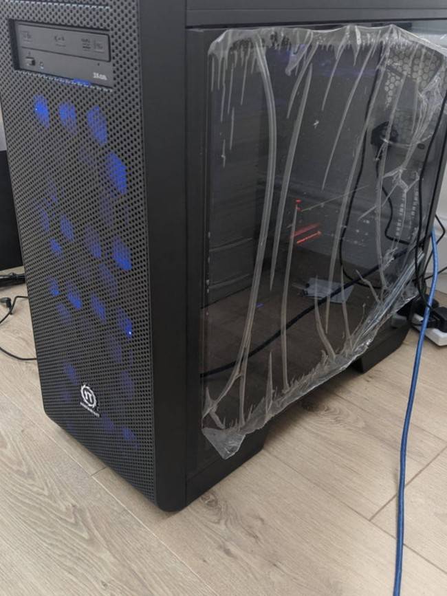 melted plastic on side of computer because husband refuses to peel it off