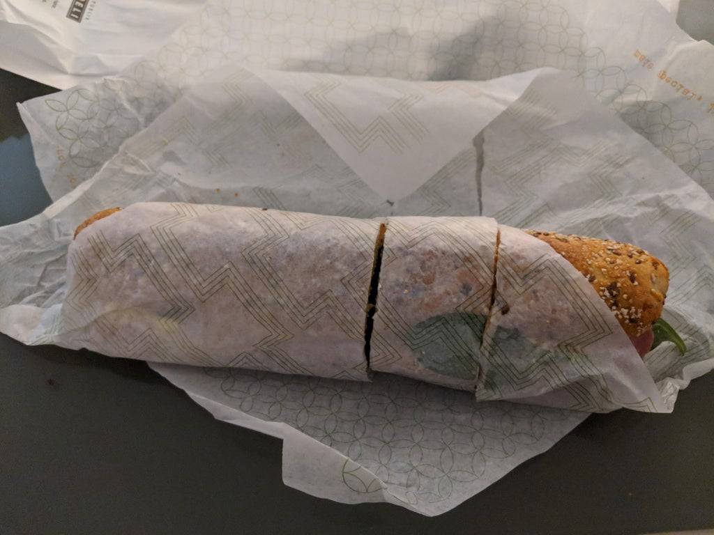 sandwich cut unevenly in three pieces