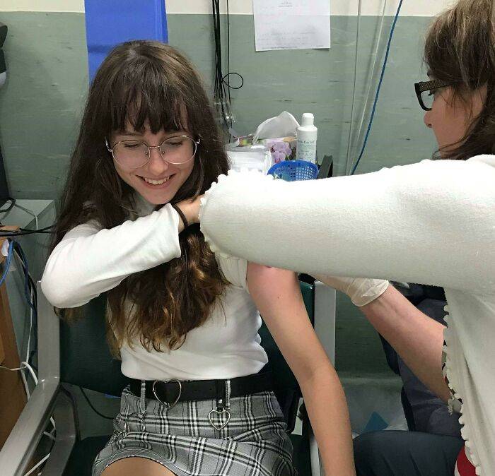girl getting vaccinated