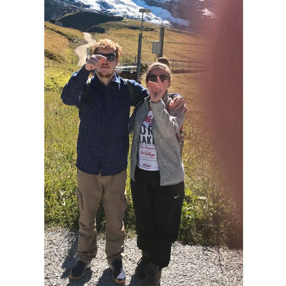 photo of couple on mountain 