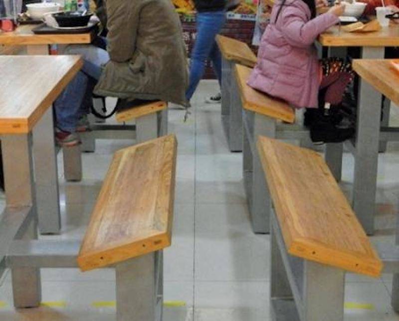 tilted benches food court