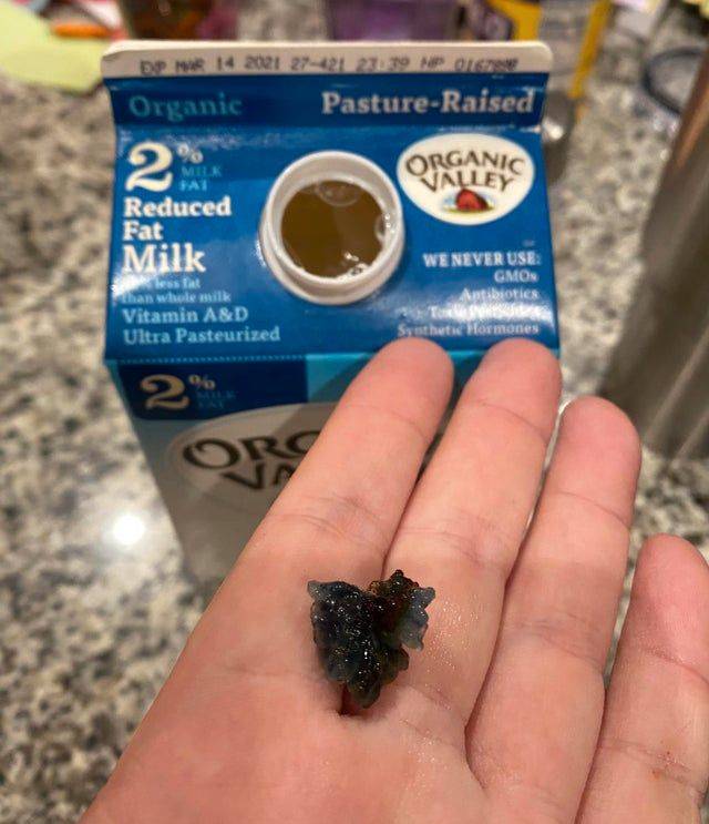 blue crystal in hand