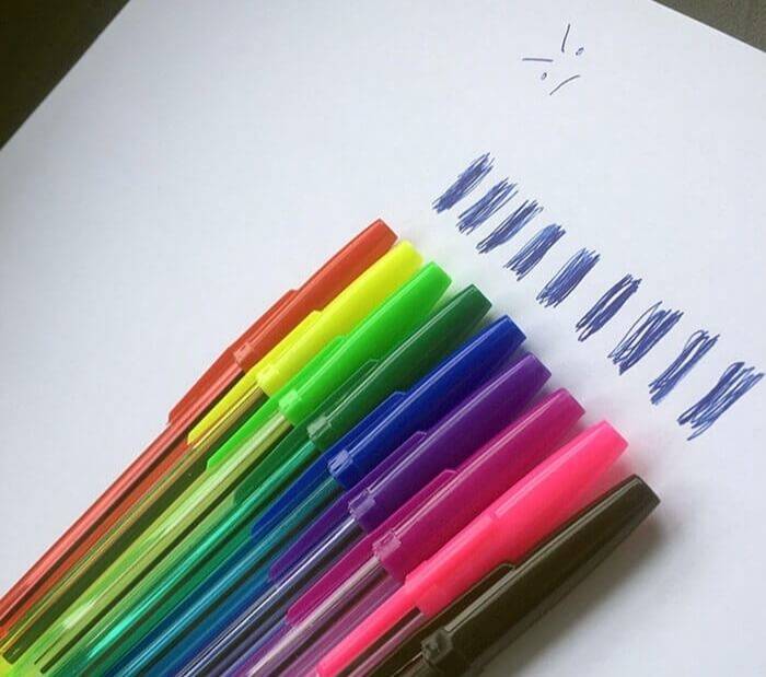 colored pens with blue ink