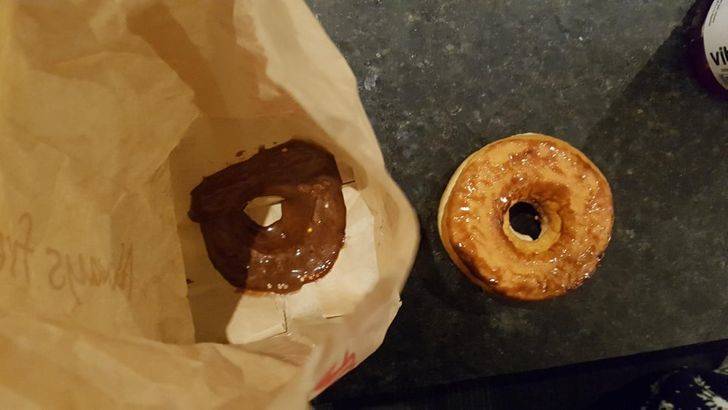 donut toppings stuck to bottom of paper bag