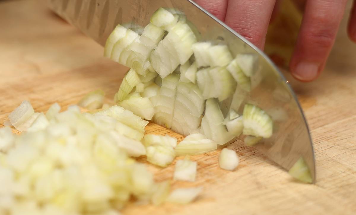 A general view of an onion being cut.