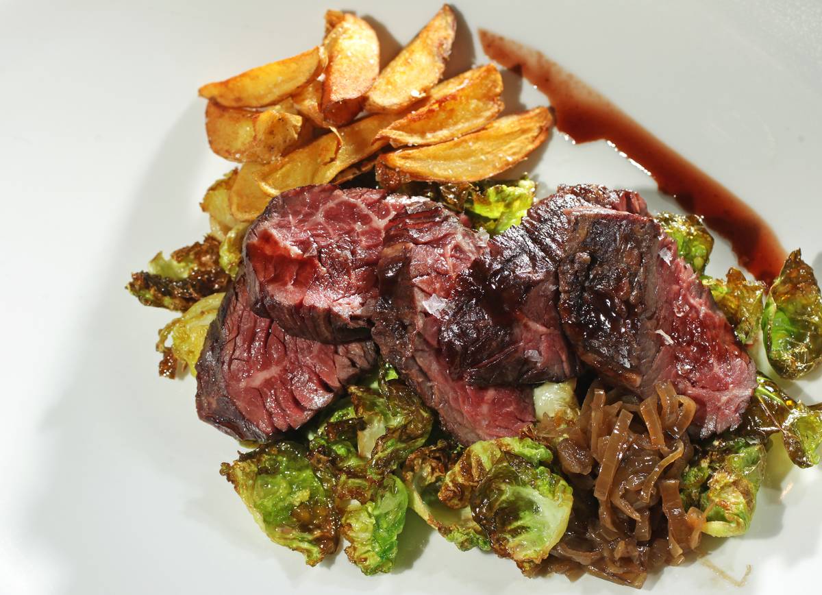 steak and fries plate at a restaurant