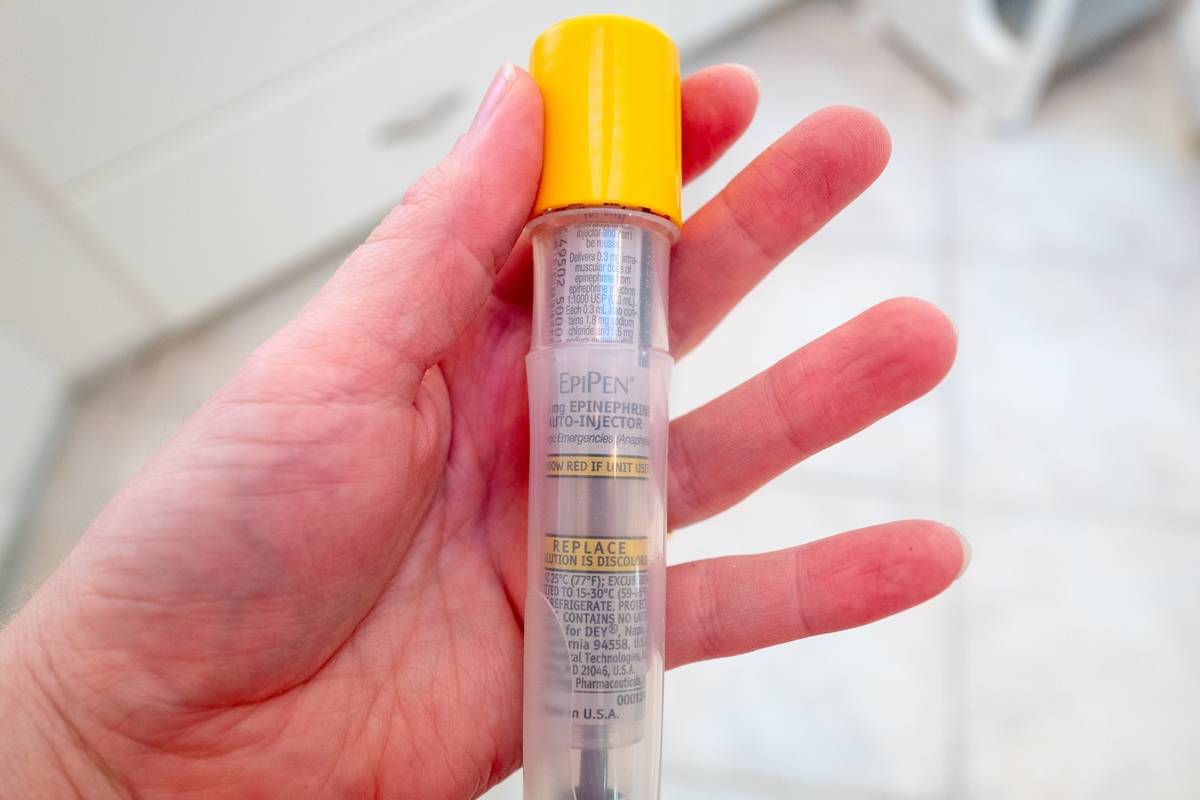 Hand Holding Epipen