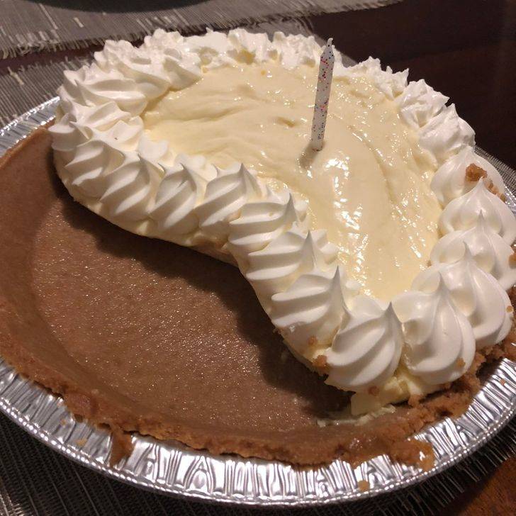 filling of lemon pie scrunched to one side of crust