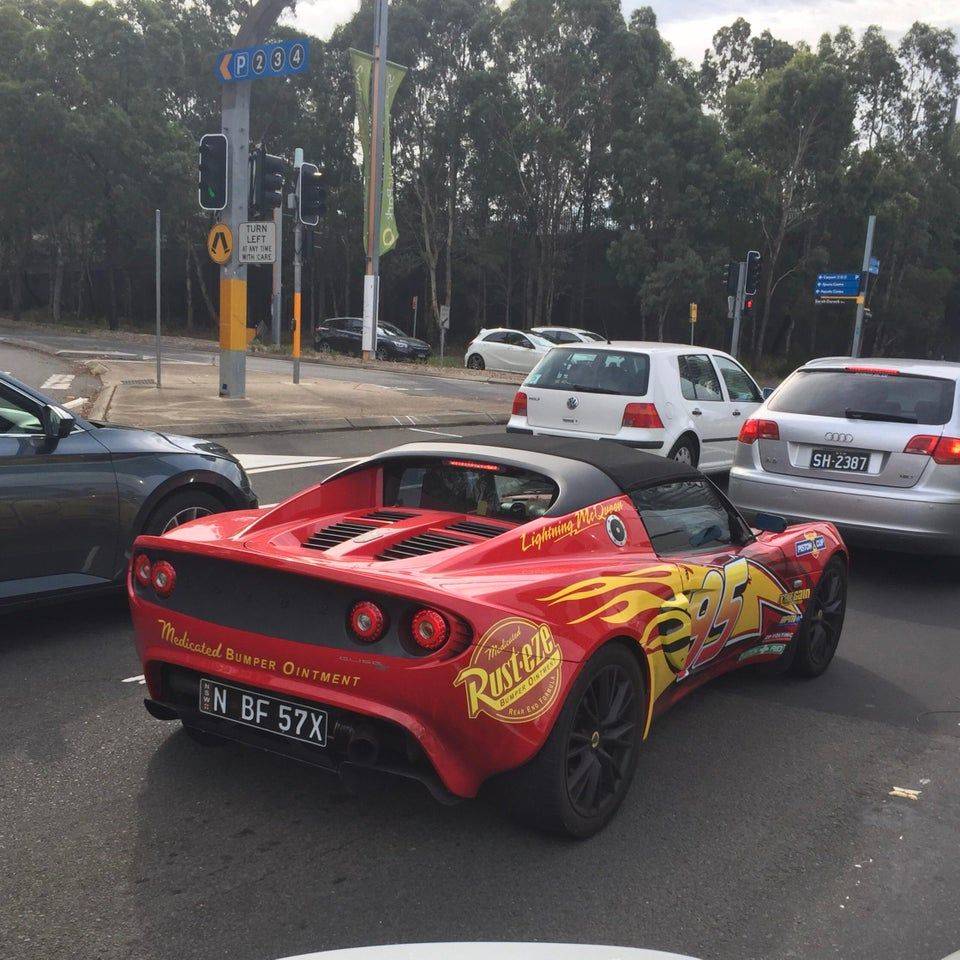 car that looks like lightning mcqueen from disney movie 