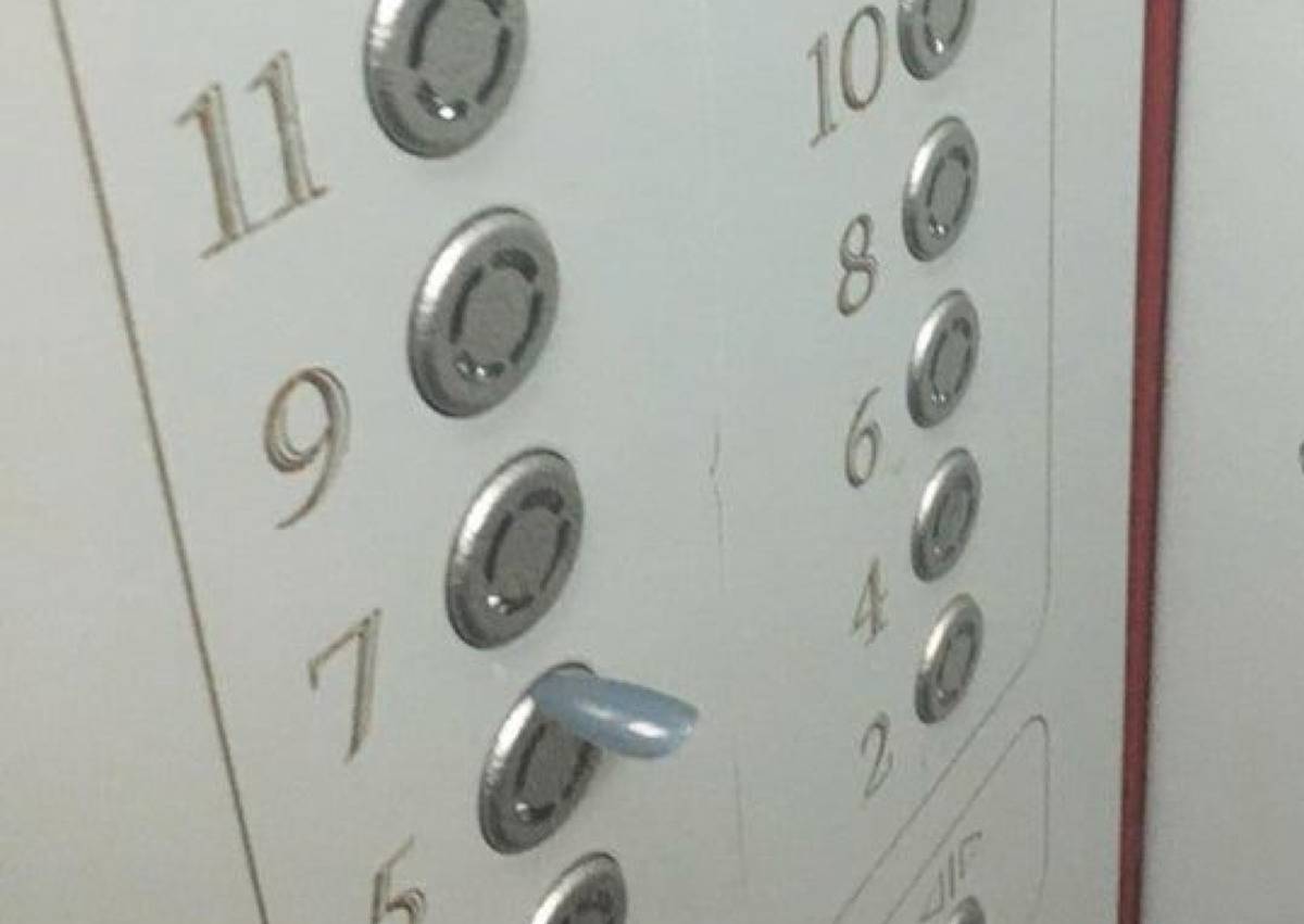 acrylic nail stuck in elevator button